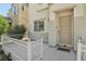 Cozy front porch with a secure metal door and a welcoming 