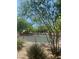 Community park featuring a playground shaded by mature trees, offering a delightful play space at 7640 Woven Memories St, Las Vegas, NV 89149