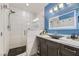 Contemporary bathroom featuring a sleek vanity, unique sink, and a glass-enclosed shower with modern fixtures at 830 Carnegie St # 512, Henderson, NV 89052