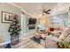 Inviting living room with a cozy sofa, decorative fireplace, and stylish furnishings under a bright ceiling at 830 Carnegie St # 512, Henderson, NV 89052