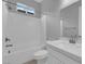 Bathroom features a shower over tub, and a marble countertop at 851 Klamath Springs St, Henderson, NV 89011