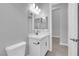This bathroom boasts a modern vanity, sleek fixtures, and a well-lit mirror at 851 Klamath Springs St, Henderson, NV 89011