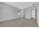 Spacious bedroom with soft carpet and a neutral color scheme at 851 Klamath Springs St, Henderson, NV 89011