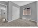 This bedroom features a window and a closet with sliding doors at 851 Klamath Springs St, Henderson, NV 89011