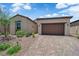 Charming single-story home with a two-car garage and low maintenance landscaping at 851 Klamath Springs St, Henderson, NV 89011