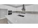 Bright kitchen with a large island, stainless steel appliances, and quartz countertops at 851 Klamath Springs St, Henderson, NV 89011