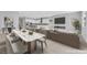 Modern living room features a fireplace, sleek furniture, and an open kitchen at 851 Klamath Springs St, Henderson, NV 89011
