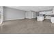 Open-concept living room with tile flooring and ample space for entertaining at 851 Klamath Springs St, Henderson, NV 89011