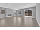 Expansive living area with large windows and sliding glass doors for natural light at 851 Klamath Springs St, Henderson, NV 89011