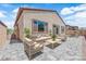 Cozy outdoor patio with comfortable seating, landscaping and hardscape at 851 Klamath Springs St, Henderson, NV 89011