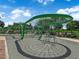 Modern community playground featuring a unique green climbing structure at 851 Klamath Springs St, Henderson, NV 89011