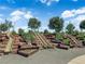 Multi-level playground slides, built into hillside, offer fun for all ages at 851 Klamath Springs St, Henderson, NV 89011
