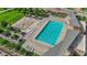 Community outdoor pool, lounge chairs, splash pad, shade and walking paths at 851 Klamath Springs St, Henderson, NV 89011