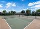 Well-maintained community tennis courts with fencing and surrounding landscaping at 851 Klamath Springs St, Henderson, NV 89011
