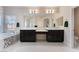 Luxurious primary bathroom with dual sinks, a soaking tub, separate shower, and pristine finishes at 8605 Trianon Ln, Las Vegas, NV 89145