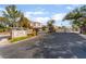 Community entrance to Tuscany Hills North featuring decorative landscaping at 8605 Trianon Ln, Las Vegas, NV 89145