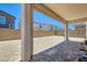 Backyard area showcasing a patio with brick flooring and a spacious area ready for landscaping and outdoor enjoyment at 9440 Lunar Ray St, Las Vegas, NV 89143