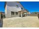 The backyard displays an expansive space, ready for customization with a patio cover and block wall for added privacy at 9440 Lunar Ray St, Las Vegas, NV 89143