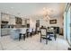 Bright kitchen with an island, pendant lighting, and an adjacent dining area at 9440 Lunar Ray St, Las Vegas, NV 89143