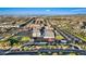 Community school featuring multiple buildings, a playground, and ample parking in a planned neighborhood at 9972 Terrastone Dr, Las Vegas, NV 89148