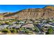 A gorgeous view of this Gathering-friendly neighborhood nestled at the base of the surrounding mountains at 9972 Terrastone Dr, Las Vegas, NV 89148