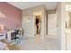 Bedroom featuring a desk, colorful rug, and closet, providing a comfortable and functional space at 9972 Terrastone Dr, Las Vegas, NV 89148