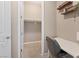 Office space with gray chair and white desk, alongside an open closet, promoting productivity at 9972 Terrastone Dr, Las Vegas, NV 89148