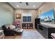 Play room featuring fun decorations, natural light, and comfortable seating at 9972 Terrastone Dr, Las Vegas, NV 89148
