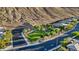 Street level view of a well-manicured neighborhood park with mature landscaping and walking paths at 9972 Terrastone Dr, Las Vegas, NV 89148