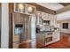 Stylish kitchen featuring stainless steel appliances, sleek cabinetry, and ample countertop space at 10621 Tinta Ln, Las Vegas, NV 89144