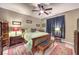 Cozy bedroom features a comfortable bed and stylish furnishings at 10961 Winter Rise St, Las Vegas, NV 89141