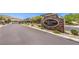 Stone community entrance with the neighborhood name 'Highland Hills' on an elegant monument sign at 10961 Winter Rise St, Las Vegas, NV 89141