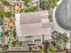 Overhead aerial view shows the house and well-maintained landscaping, including hardscape at 1145 Glacier Park Ct, Henderson, NV 89052