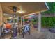 Extended covered patio area overlooking a brick-lined outdoor dining space at 1145 Glacier Park Ct, Henderson, NV 89052