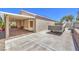 Spacious backyard with covered patio, storage shed, and parking area at 1145 Glacier Park Ct, Henderson, NV 89052