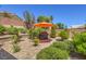 Beautifully landscaped backyard with a grill area and ample space for outdoor entertaining at 1145 Glacier Park Ct, Henderson, NV 89052