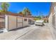 Backyard features a storage shed, parking for vehicles, a retaining wall and a block wall fence at 1145 Glacier Park Ct, Henderson, NV 89052