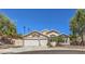 Charming two-story home with a three-car garage and manicured landscaping at 1145 Glacier Park Ct, Henderson, NV 89052