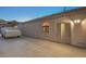 Back exterior view with covered trailer parked on a concrete pad at 1145 Glacier Park Ct, Henderson, NV 89052