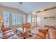 Bright living room with plantation shutters, comfortable seating, and a welcoming atmosphere at 1145 Glacier Park Ct, Henderson, NV 89052