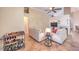 Cozy living area with comfortable seating and a fireplace, seamlessly connected to the dining area and kitchen at 1145 Glacier Park Ct, Henderson, NV 89052