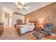 Serene main bedroom with warm tones, plush carpeting, and comfortable furnishings, creating a relaxing retreat at 1145 Glacier Park Ct, Henderson, NV 89052