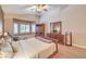Spacious main bedroom with lots of natural light, comfortable furnishings, and stylish decor for a peaceful sanctuary at 1145 Glacier Park Ct, Henderson, NV 89052
