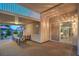 A covered patio showcases seating, backyard views, and a sliding glass door for indoor-outdoor living at 1145 Glacier Park Ct, Henderson, NV 89052