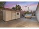 Home exterior with shed, covered trailer and driveway at 1145 Glacier Park Ct, Henderson, NV 89052