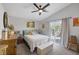 Bright bedroom with a ceiling fan, slider door, and cozy décor at 1246 Diamond Valley St, Henderson, NV 89052