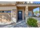 Charming home featuring a two-car garage, a well-kept lawn, and a covered entryway at 1246 Diamond Valley St, Henderson, NV 89052