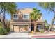 Charming two-story home featuring a well-manicured lawn and a two-car garage at 1246 Diamond Valley St, Henderson, NV 89052