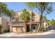 Inviting two-story home showcasing a two-car garage, neat landscaping, and a charming entryway at 1246 Diamond Valley St, Henderson, NV 89052