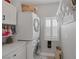 Efficient laundry area with stacked washer/dryer and ample storage at 1246 Diamond Valley St, Henderson, NV 89052
